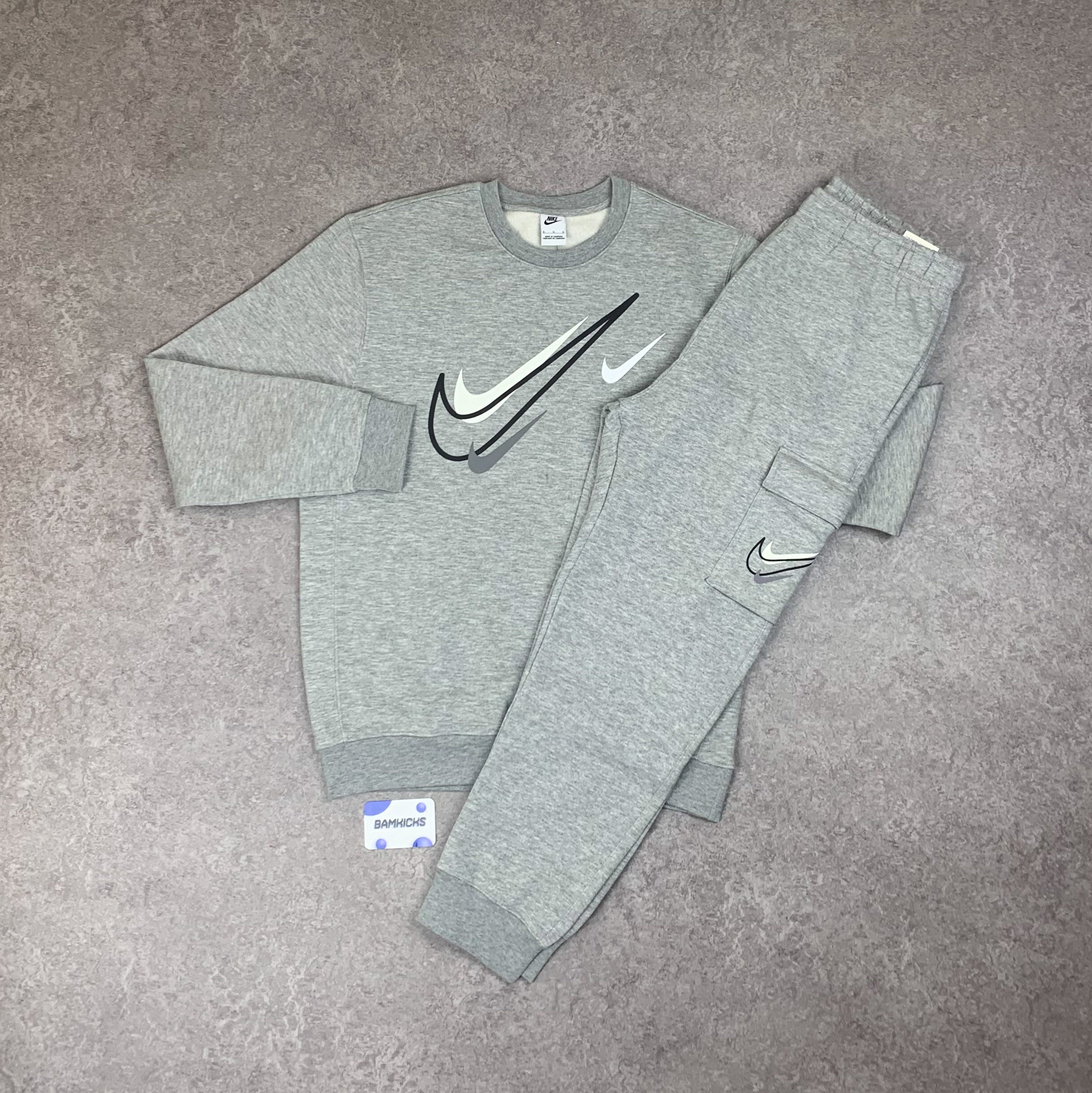 grey nike swoosh tracksuit