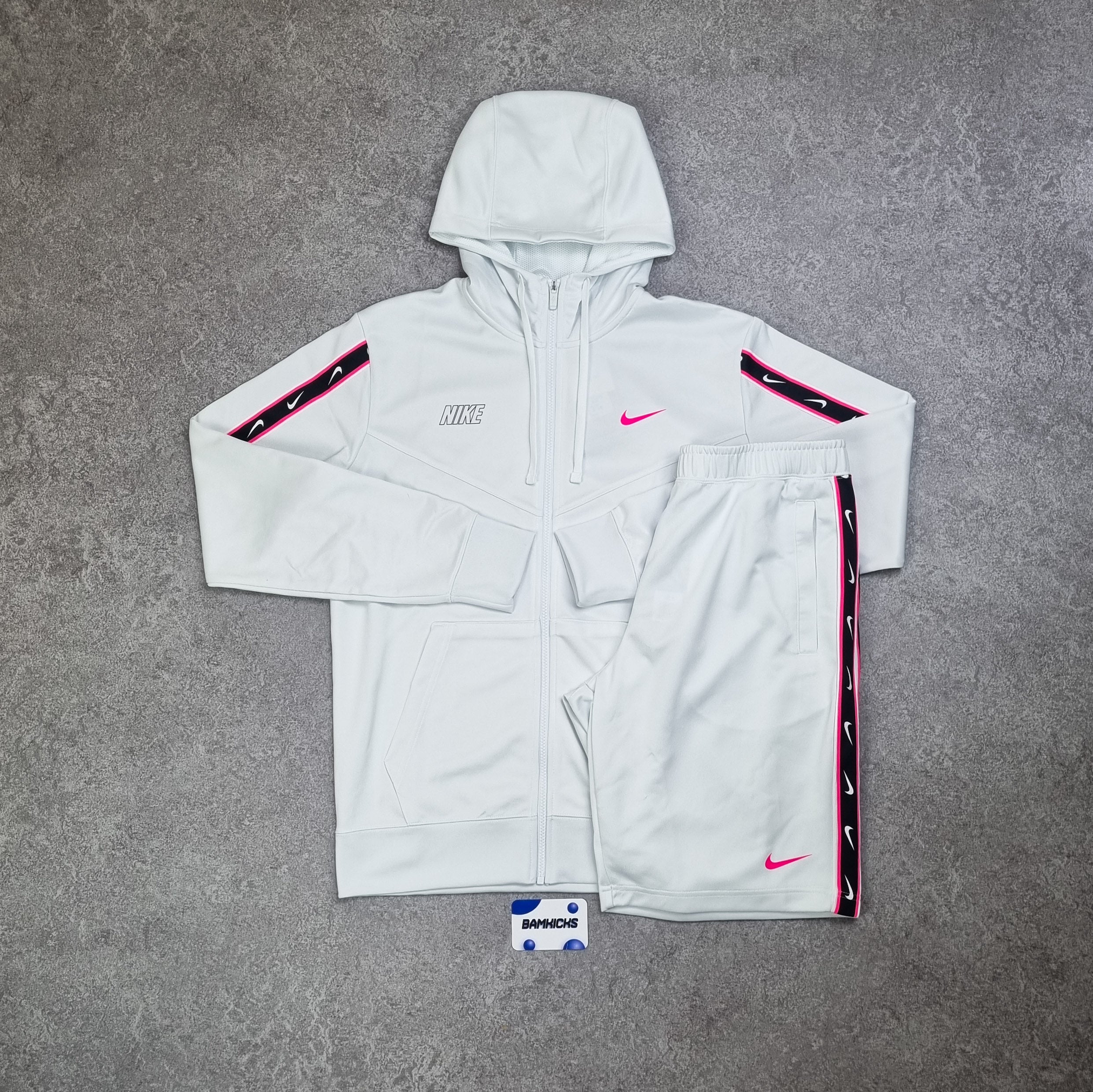 Pink and white nike tracksuit online